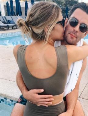 Alix Klineman with her boyfriend Teddy Purcell in a pool.